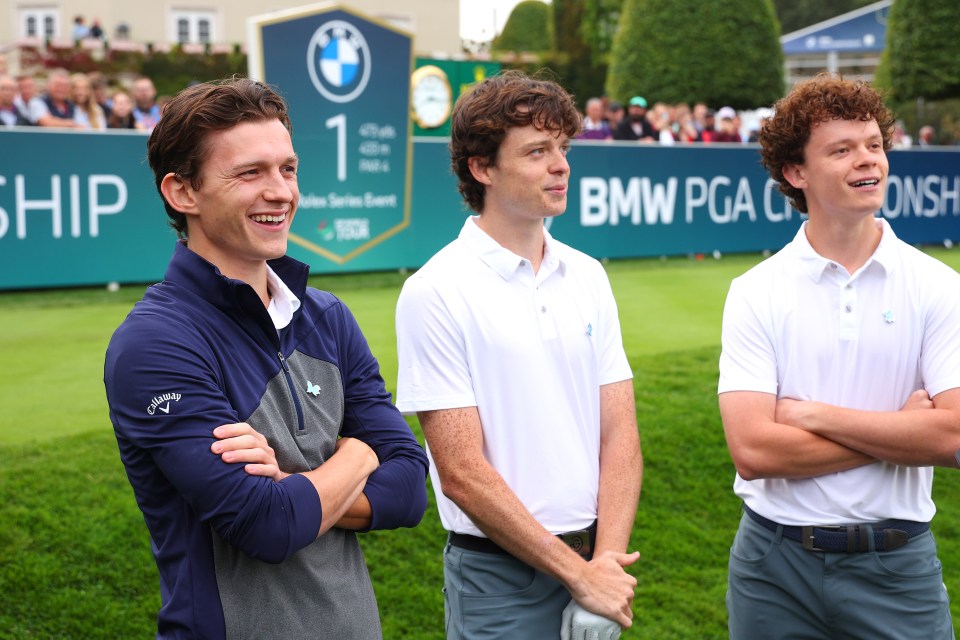 Holland appeared alongside his twin brothers Sam and Harry