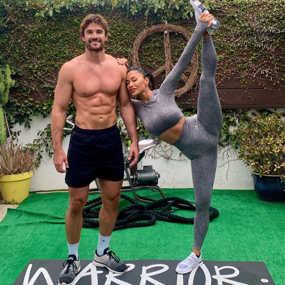 The singer with her equally-fit partner Thom Evans