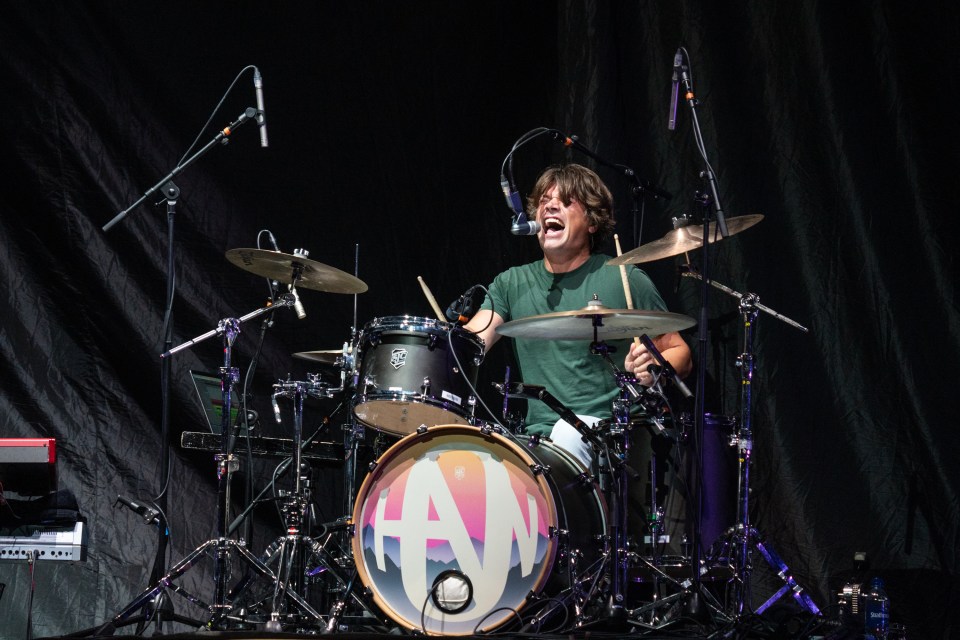 Zac Hanson beat his drums and sang passionately from the back of the stage