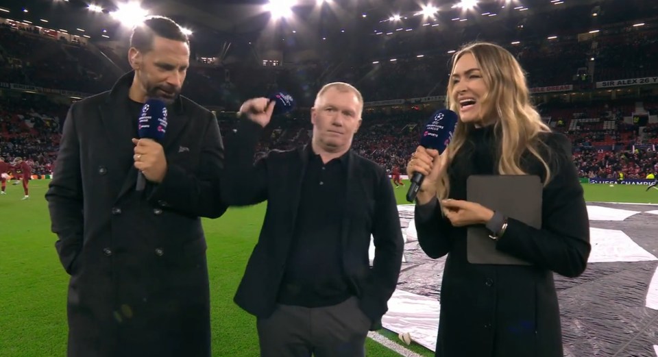 Scholes pretending to throw his dud microphone away