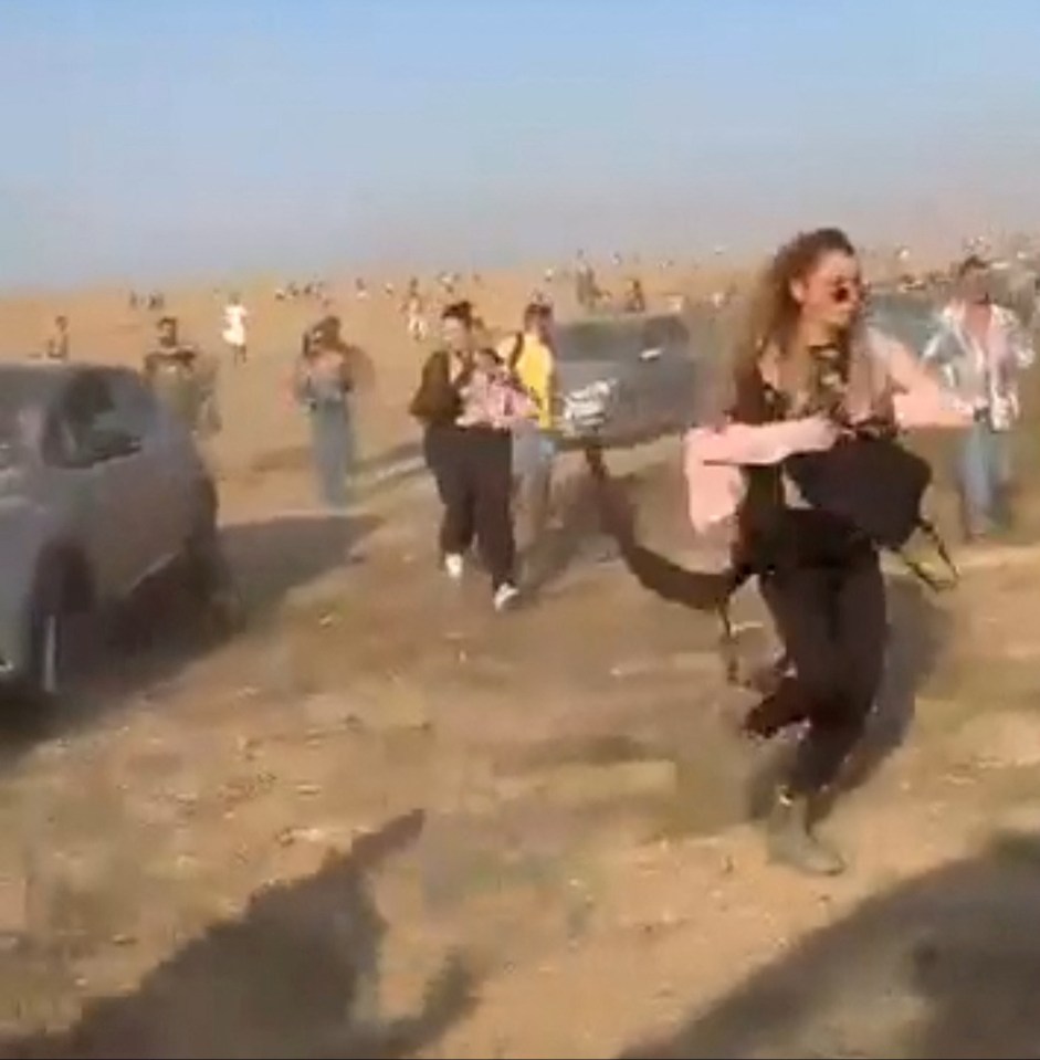 Festival-goers flee from the heavily-armed murderous Hamas terrorists