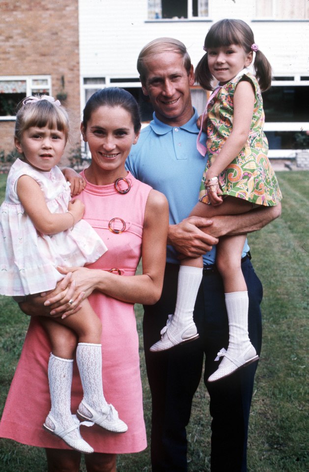 Bobby and Norma holding their two daughters