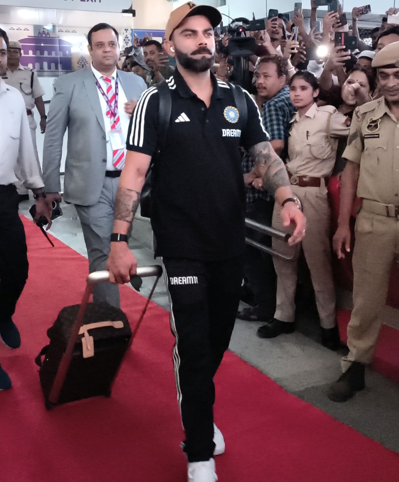 Virat Kohli arrives at the airport ahead of the ICC Cricket World Cup 2023 warm-up match in Guwahati