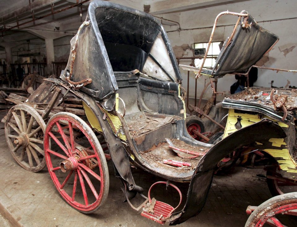 A rotting royal coach at a shed in the former Royal Palace of Tatoi - located 15km north of Athens