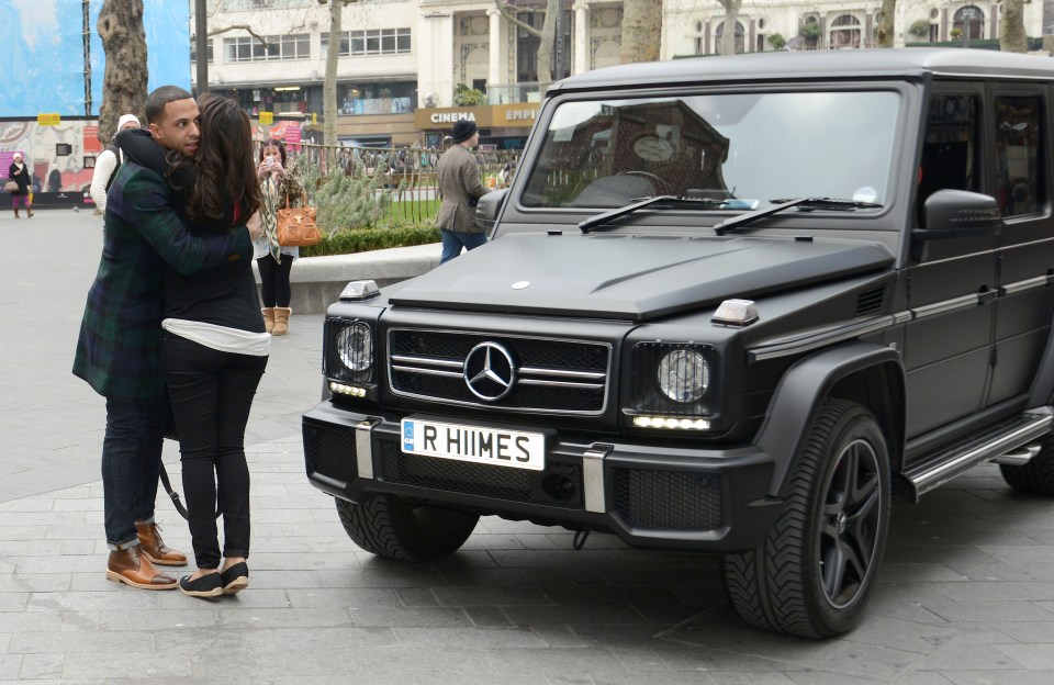 Marvin and Rochelle Humes cuddle by her jet black G-Wagon in March 2013