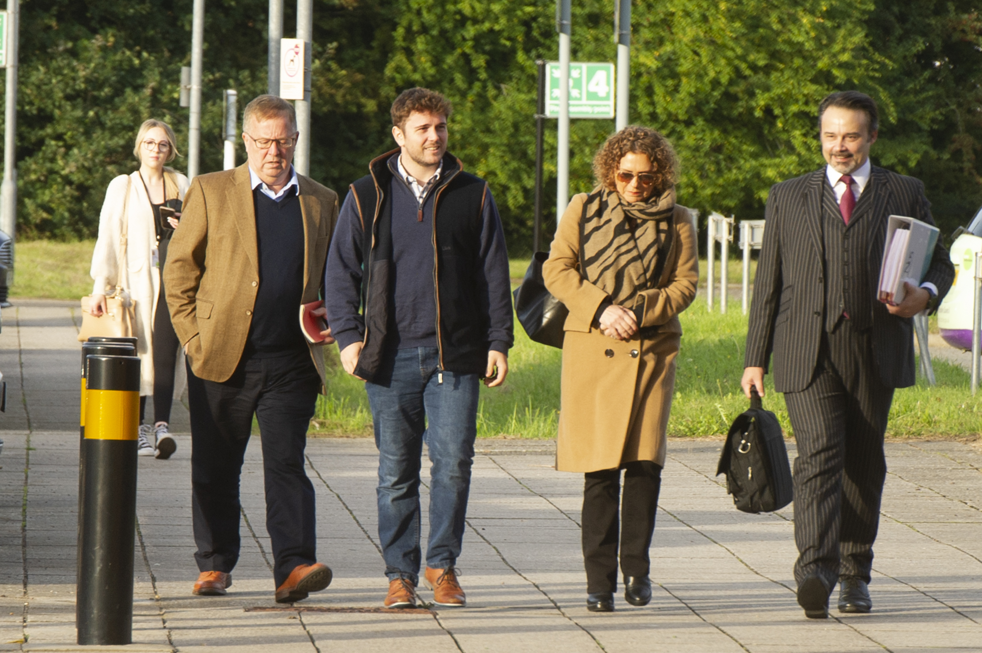 The family were snapped arriving at the council chambers this morning