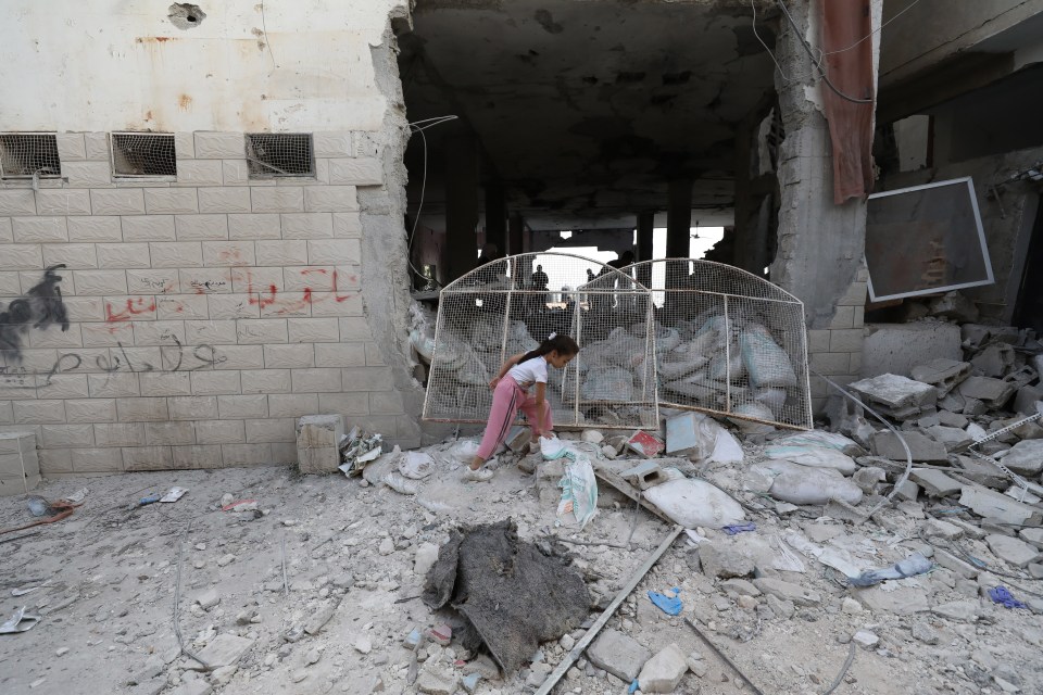 The mosque was left with gaping holes in its exterior walls, surrounded by debris