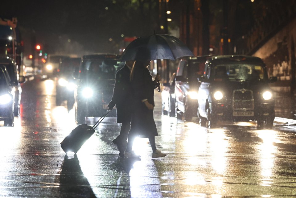 Downpour outside King's Cross, central London