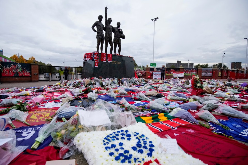 The iconic United Trinity statue has been surrounded with tributes