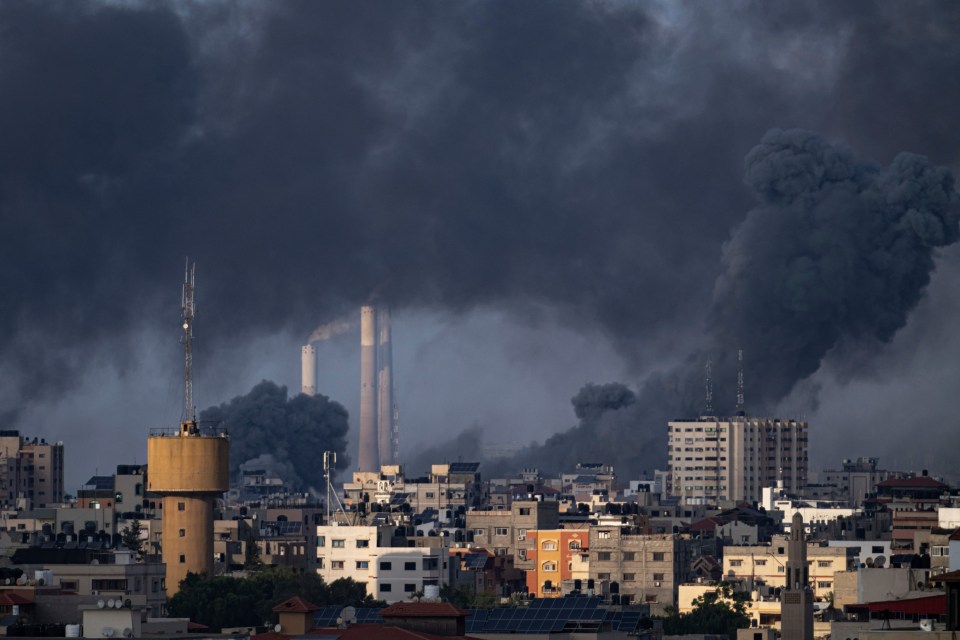 Smoke can be seen in the sky following an Israeli airstrike in Gaza City