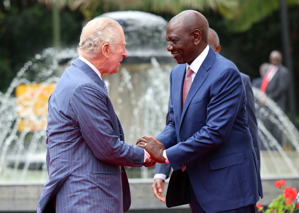 The King beamed as he met the Kenyan president