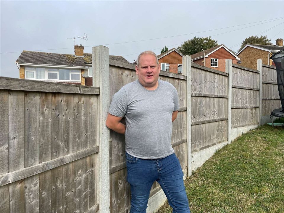 Richard Hickson has been ordered to rip out his fence a ruin the garden he paid £25k for