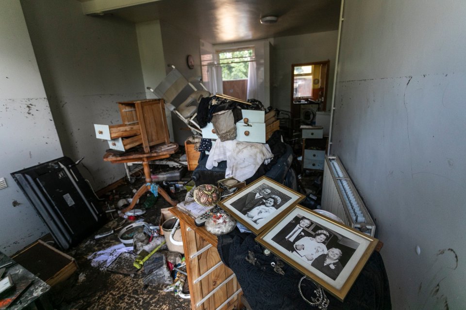 The lines on walls show how high the flood levels rose inside the property