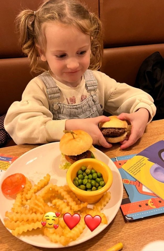 Sue shared a picture of daughter Bonnie enjoying her mini burgers and chips