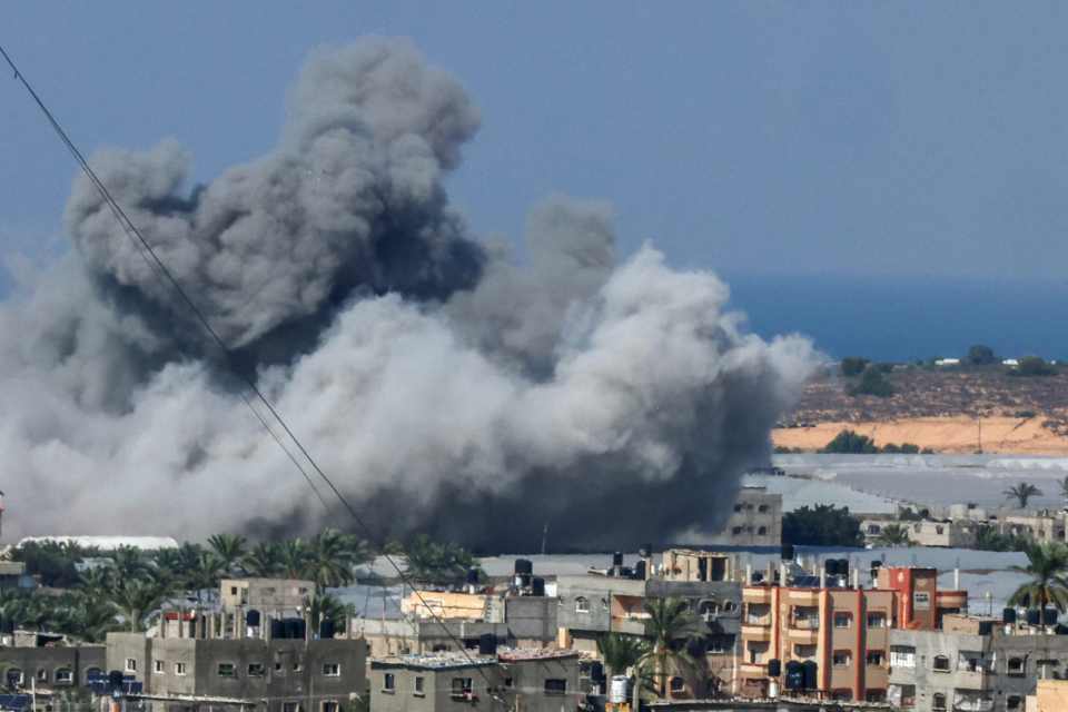 Smoke billows after an Israeli air strike in Rafah in the southern Gaza Strip