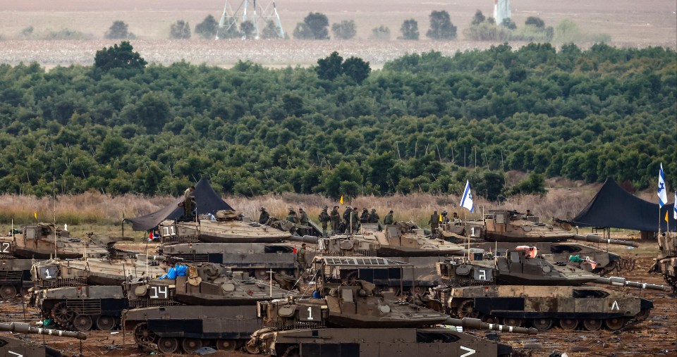 Israeli troops at the border ahead of a ground invasion