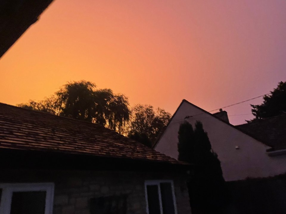 Social media users uploaded pictures of the curious orange glow