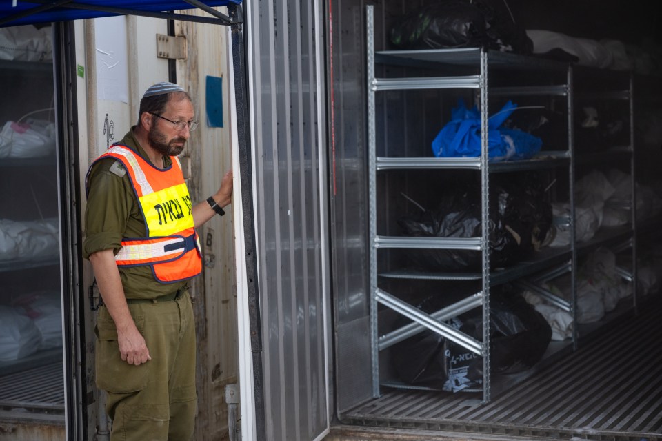 A makeshift morgue has been built at a military base where dental and forensic experts work day and night