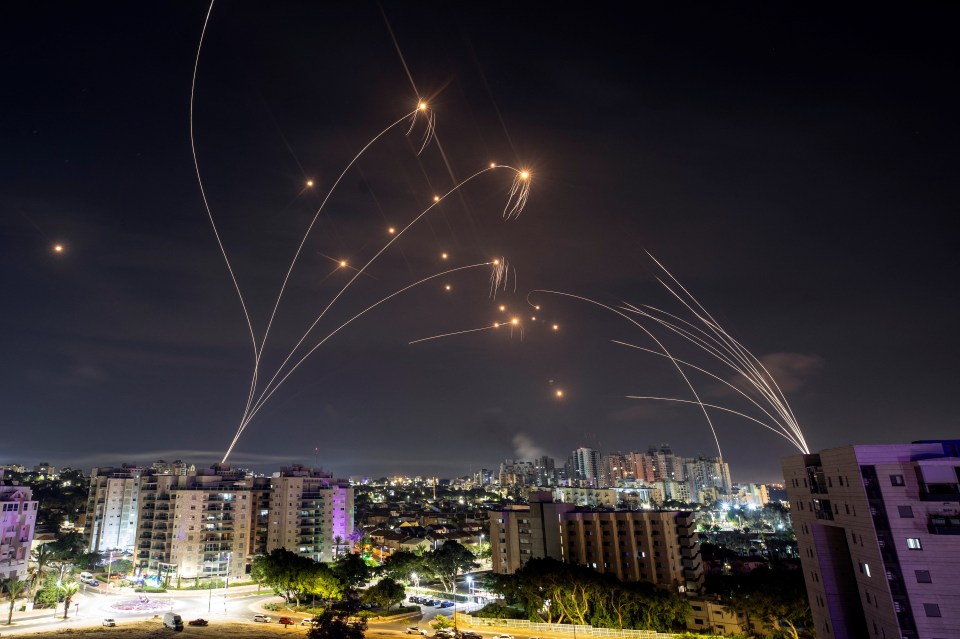 Israel's Iron Dome anti-missile system intercepts rockets launched from the Gaza Strip, as seen from Ashkelon in southern Israel October 8, 2023. REUTERS/Amir Cohen