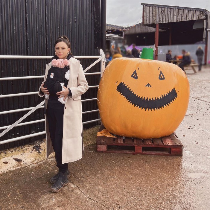 Cher went pumpkin picking with Eliza, her husband, and Delila, her daughter