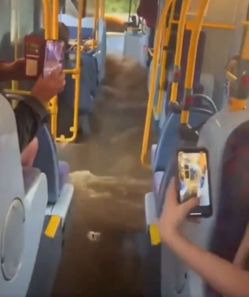 School kids were left panicked when flood water took over their bus on the way home