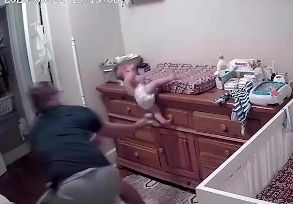 In the video, a parent has to catch their child after it falls while their back was turned for a second