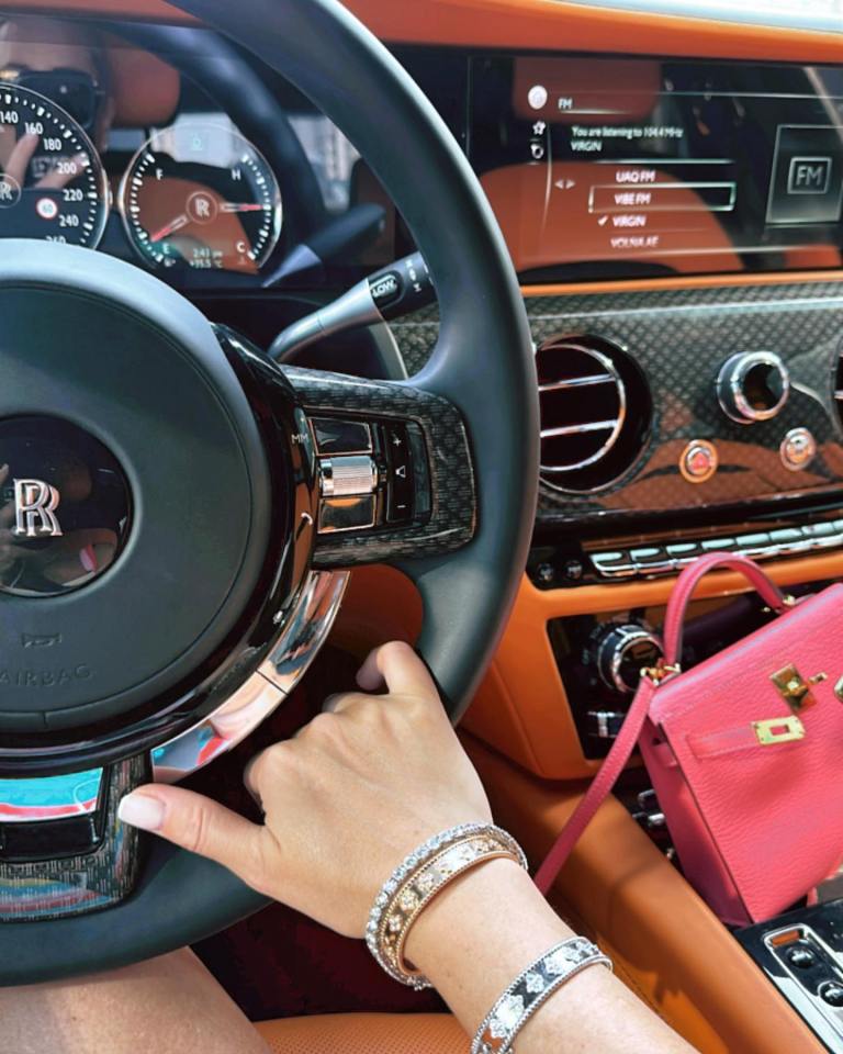 Roxy showed off her posh car, hand bag and bling