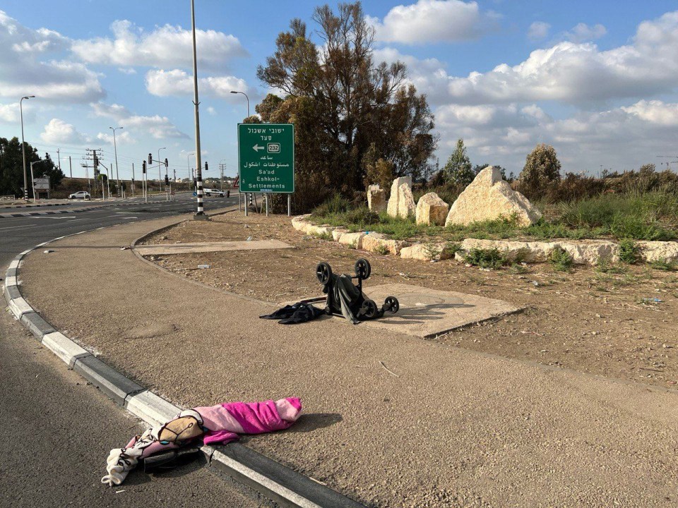 An overturned pram was pictured on the street