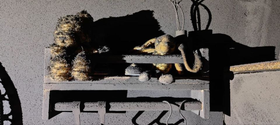 Another heartbreaking photo shows two burnt teddies