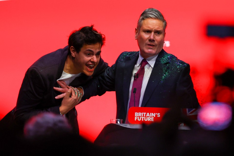 Starmer led the Labour conference in a standing ovation for stricken Israel yesterday, after an Extinction Rebellion activist dumped sparkles over his head