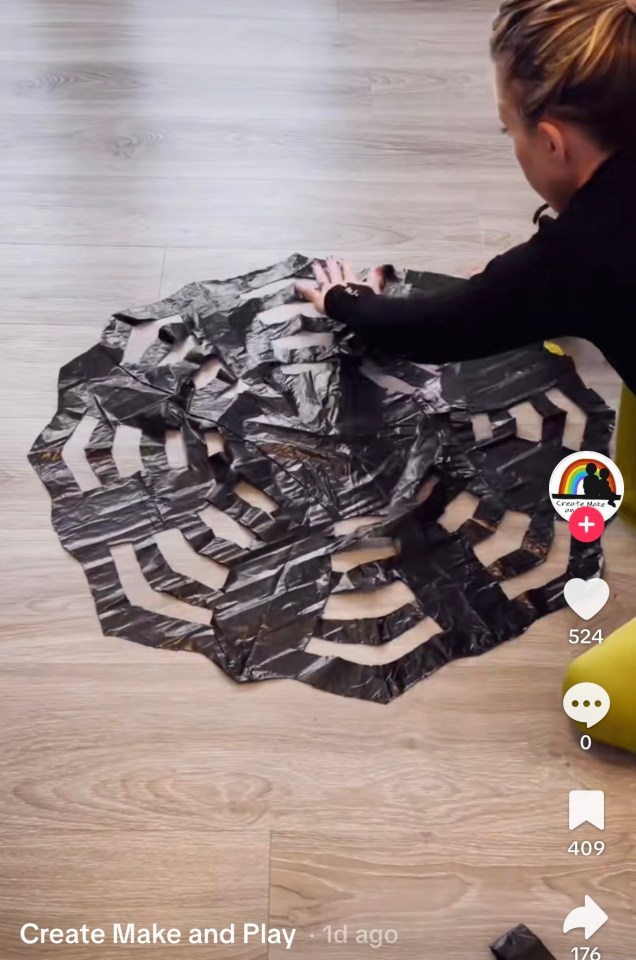 Spider web bin liner Credit: TikTok/@Create_Make_and_Play