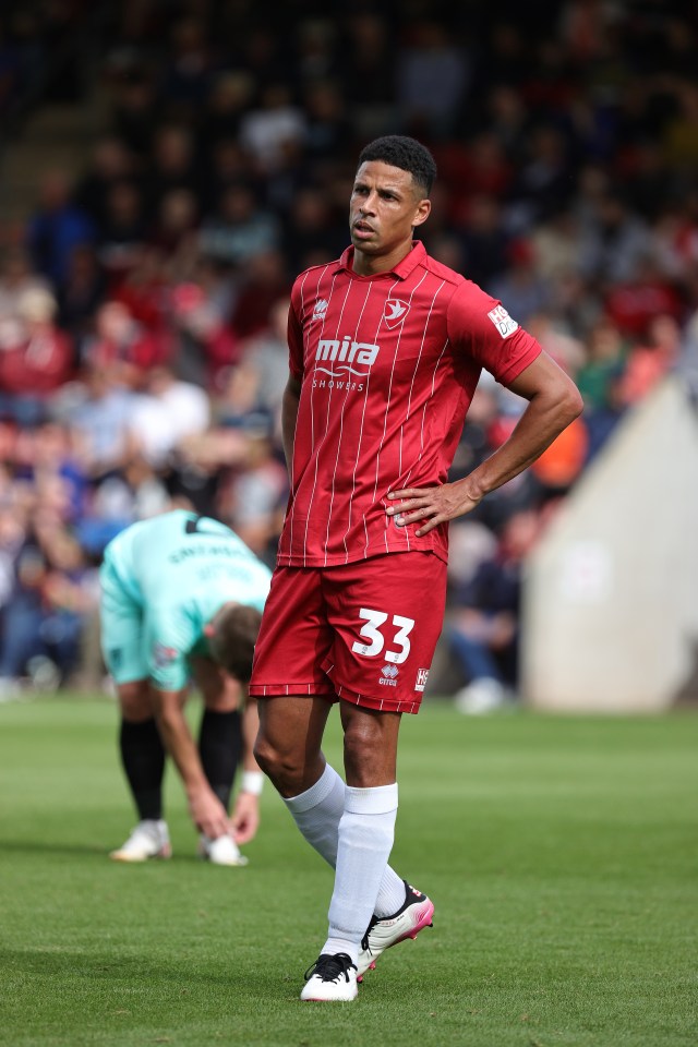 Cheltenham Town’s 38-year-old defender received a shock call-up from Sierra Leone