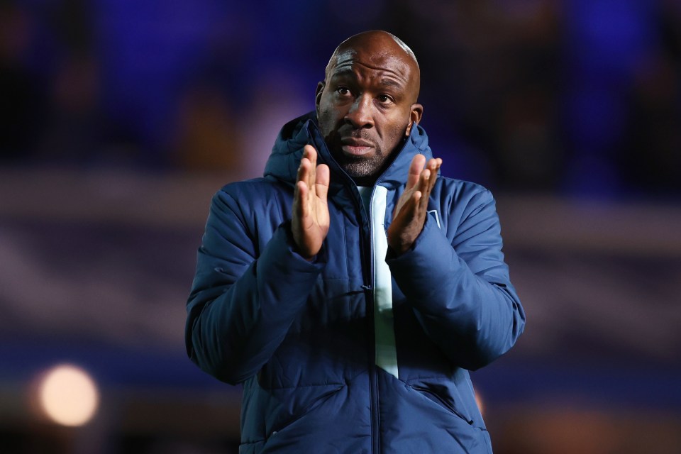 Darren Moore replaced Warnock at Huddersfield