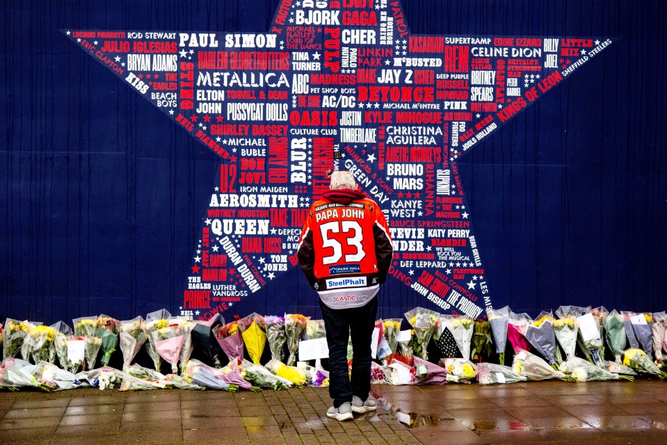 Fans lay their respects and lay flowers tributes at the Utilita Arena Sheffield