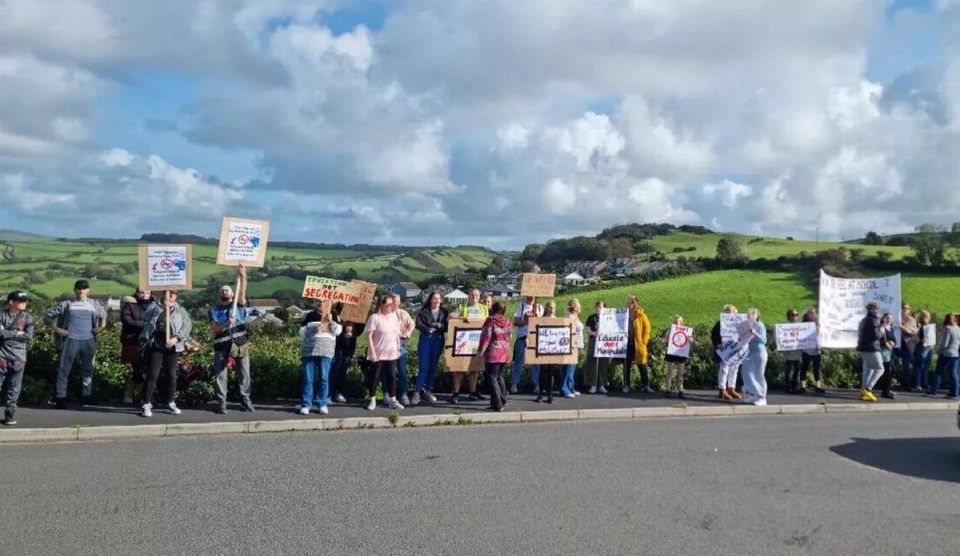 The families staged protests against the strict school this week