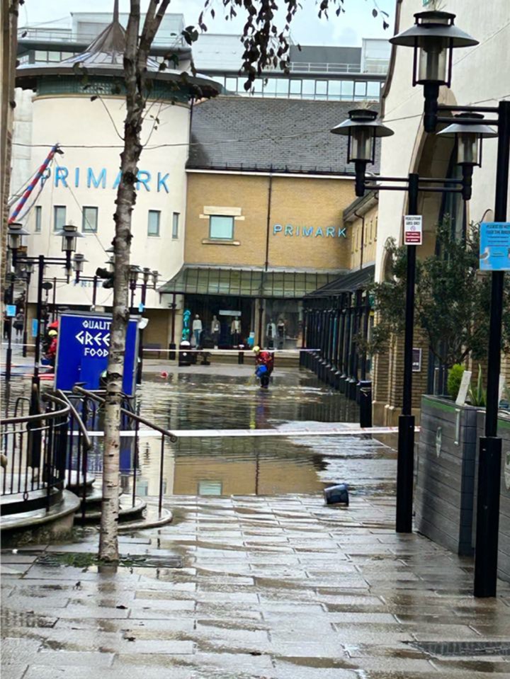 A shopping centre in East Sussex was forced to evacuate after flooding on Saturday morning