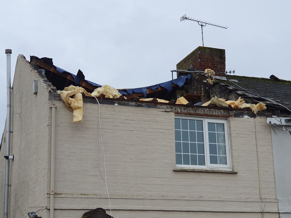 Bedroom furniture and the chimney stack were hurled across the street by the whirlwind