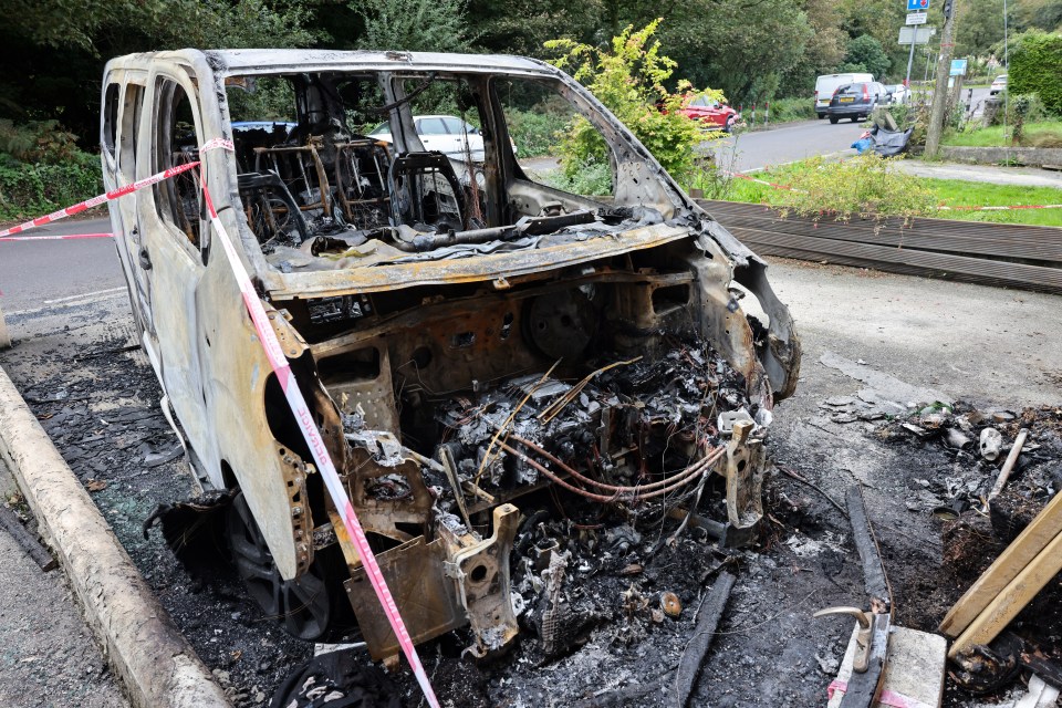 The ferocity of the fire that started in the electric van is evident, with the front end of the vehicle completely melted by the flames