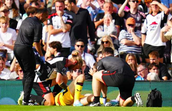 Fulham’s Tim Ream tended to Basham before the ambulance crew could arrive