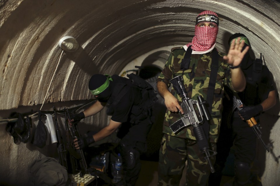 Armed fighters in one of the underground tunnels in Shujaya neighborhood of Gaza City