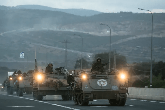 Israeli military on the move near the border with Lebanon Credit: Getty