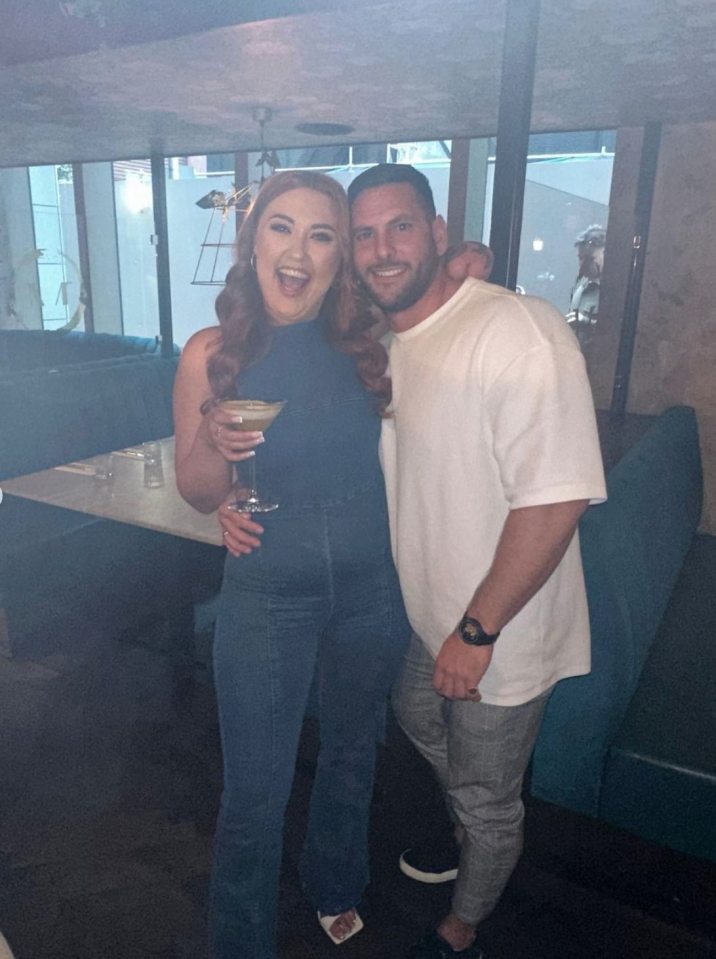 She looked stunning in a denim jumpsuit as she enjoyed cocktails in a bar