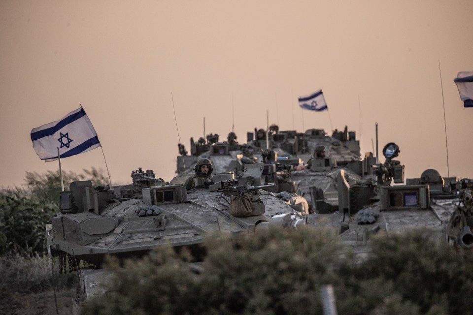 Israeli tanks move close to the Gaza border ahead of a possible ground incursion