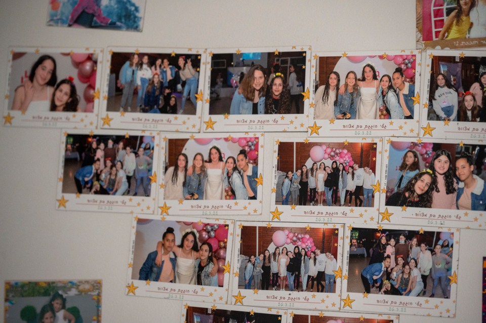 Photos stuck on a wall show the sisters at parties and with friends