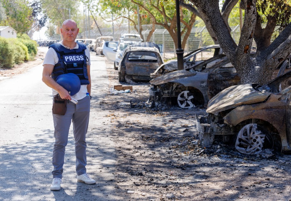 The Sun's Nick Parker is reporting from Nir Orz among the burnt out cars