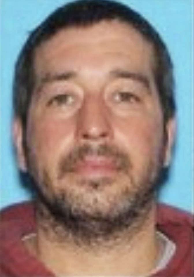 A police bulletin has identified Robert Card, 40, as a shooting suspect