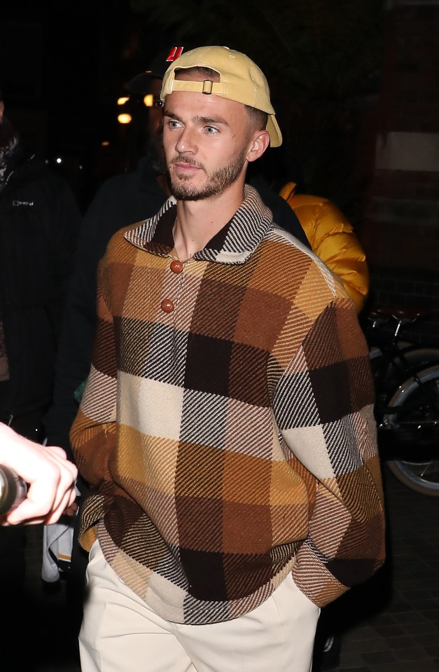 Spurs James Maddison wore a yellow cap and eye-catching jumper