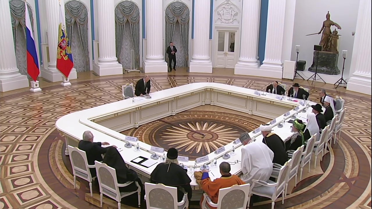 Vladimir's comically large table he conducts major meetings over