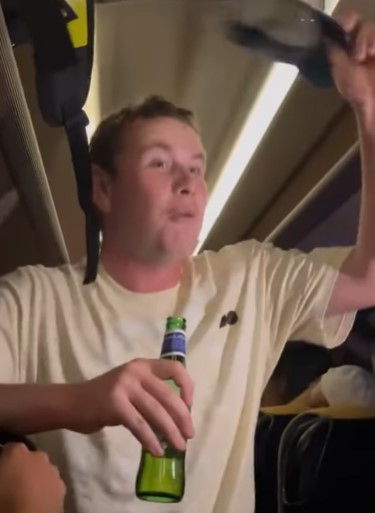 Bob McIntyre leads the drinking and singing on the team bus