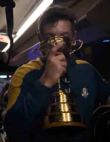 McIlroy drank deep from the trophy in wild scenes